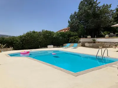 a swimming pool in a villa at Villa Flore in Casteldaccia