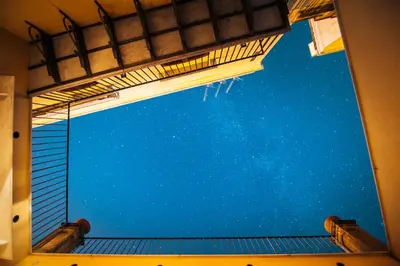 a view of the sky from a window at Casa al Bragone in Termini Imerese