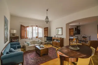a living room with a couch and a table at Casa al Bragone in Termini Imerese