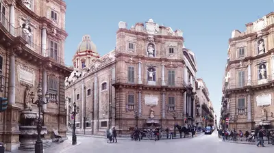 a group of people standing in front of a large building at centruMassimo b&b in Palermo