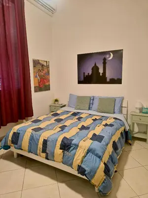 a room with two bunk beds in a room at B&B IL POETA in Palermo