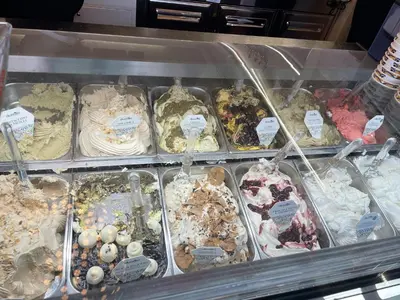 a display case with many different types of desserts at MARE AZZURRO in Campofelice di Roccella