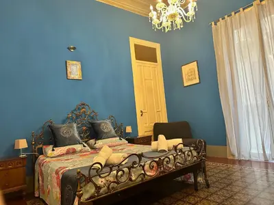 a living room with a couch and a table at Medusa in Palermo