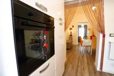 a living room with a fire place in a wall at Sol&Luna 1909 in Palermo