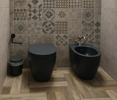 a bathroom with a black toilet and a sink at Mondello's Pearl in Mondello