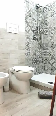 a bathroom with a toilet and a shower at Apartament Home Lory in Palermo