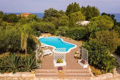 an aerial view of a swimming pool in a garden at Villa La Randa in Castellammare del Golfo