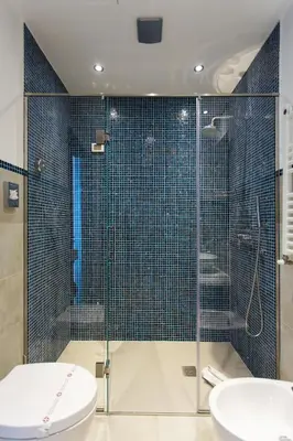 a bathroom with a shower and a toilet and a sink at Residenza Wagner in Palermo