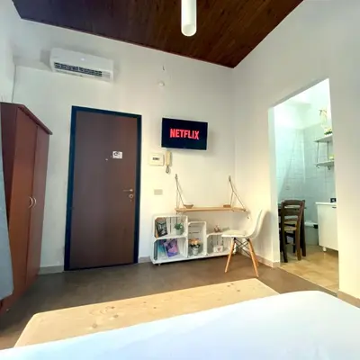a hospital room with a bed and a door at Marilù in Palermo