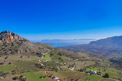 an aerial view of a vineyard on a mountain at Villa Montemar in Balata di Baida