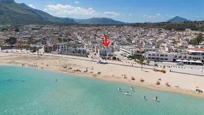 an aerial view of a beach and a city at Casa Azzurra sul mare e centralissima in San Vito lo Capo