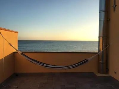 a black lamp hanging from a ceiling at Seaside 3 Bedroom Villa with 2 Terrace and private parking - Villa Porta Azzurro in Termini Imerese
