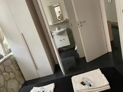 a bathroom with a sink and a mirror at Dolce Vita casa vacanze in Carini
