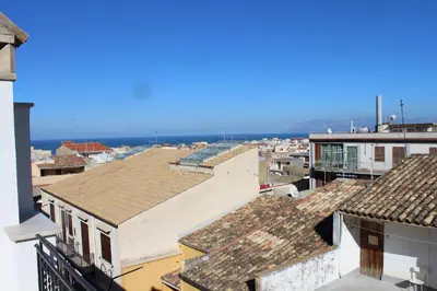 a view of roofs of buildings in a city at EXCLUSIVE HOME in Castellammare del Golfo