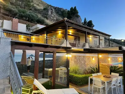 a villa with a view of the ocean at Villa Ibiscus in Mandra Capreria