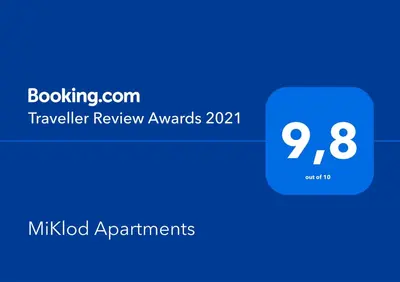 a blue box with the text travel review awards on it at MiKlod Apartments in Palermo