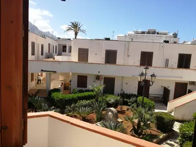 a view from the balcony of a building at Appartamento Conturrana Sul Mare in San Vito lo Capo