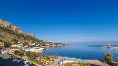 an aerial view of a beach and the ocean at B&B Una Terrazza sul Golfo di Sferracavallo in Sferracavallo