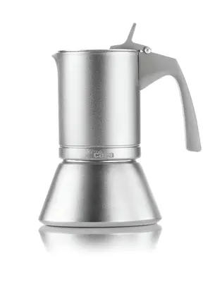 a black kettle on a white background at Dietro la Cattedrale in Palermo