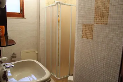 a bathroom with a sink and a shower at Da Angelo in Castellammare del Golfo