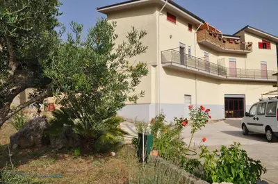 a white van parked in front of a building at Summerhouse Sagana in Monreale