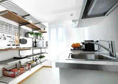a kitchen with a sink and a counter top at Maqueda331 in Palermo