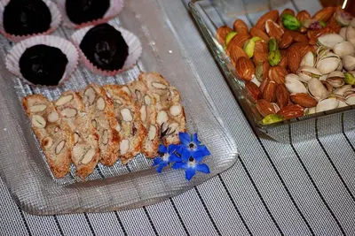 two plastic trays of different types of food on a table at Maqueda331 in Palermo