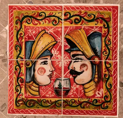 a picture of a painting of a couple at Cocciu d'amuri in San Vito lo Capo