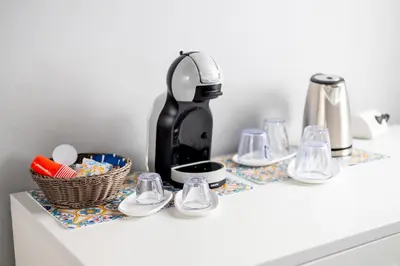 a coffee maker sitting on top of a counter at La Querencia in Palermo