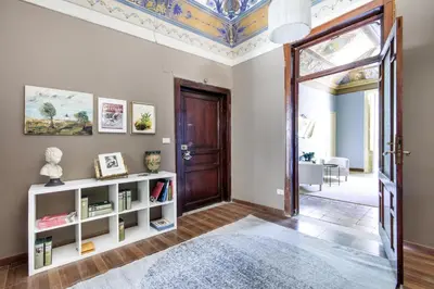 a living room with a coffered ceiling at SUITE S.LUCIA in Corleone