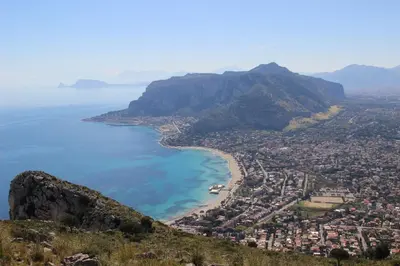 a view of a beach with a city and the ocean at Da Sophie in Mondello
