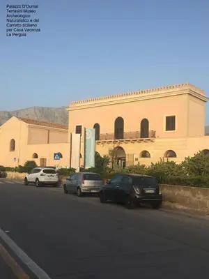 a group of cars parked in front of a building at Casa Vacanza La Pergola in Terrasini