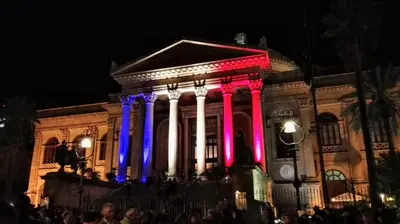 a building with colorful lights on it at night at Stranizza d'amuri, al Capo vero cuore di Palermo vedi anche atocà1 in Palermo