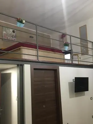 a room with a bunk bed and a door at Casa Vacanza Mar' illù in Castellammare del Golfo