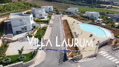a villa with a swimming pool and a resort at Villa Laurum - Giardino degli allori - Castellammare del Golfo - Scopello in Castellammare del Golfo