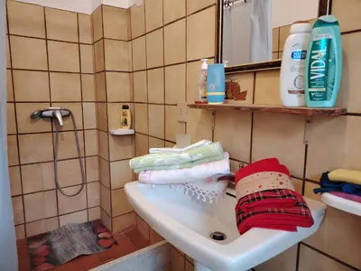 a bathroom with a sink with towels on it at Spezie House 2 PSx Climatizzata in Castellammare del Golfo
