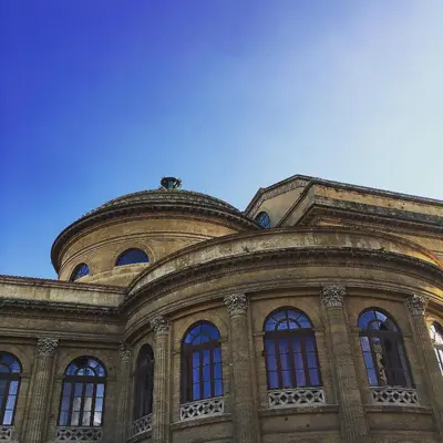 a large building with windows on top of it at Delle Vittorie Luxury Rooms&Suites in Palermo