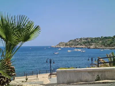 a view of a body of water with boats in it at Sea Room Aspra in Bagheria