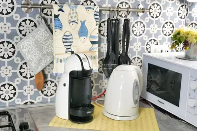 a kitchen with two appliances sitting on a counter at Annina'S Home Panoramic sea view By Sicily Home Solutions in Castellammare del Golfo