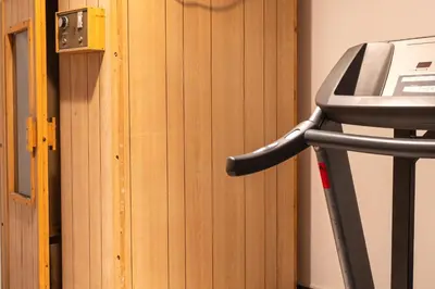 a close up of a treadmill next to a door at Villa Uluvud with Pool Gym Sauna in Alcamo