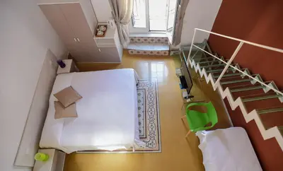 an overhead view of a bedroom with a bunk bed at Rooms 19 B&B in Palermo