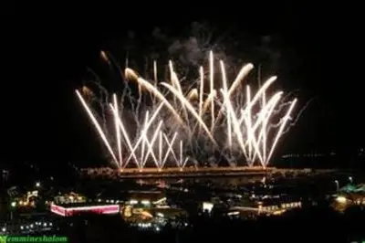 a fire show with fireworks in the sky at night at Bed Ponente in Isola delle Femmine