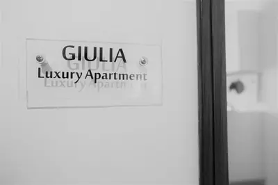 a sign on the door of a library apartment at GIULIA E CHIARA LUXURY APARTMENT in Castellammare del Golfo