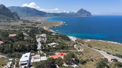 an aerial view of a beach and the ocean at Villa Gina con vista mozzafiato sul golfo di Macari in Macari