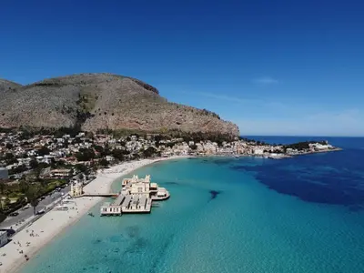 an aerial view of a beach with boats in the water at Casa marty in Mondello