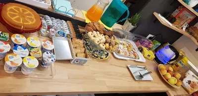 a table topped with lots of different types of food at LA FINESTRA SUL PORTO in Palermo
