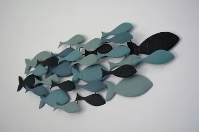 a group of fish cookies on a white surface at Sea Front in Carini