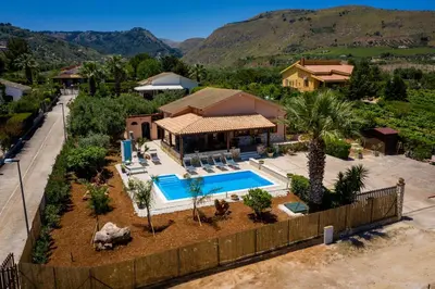 an aerial view of a house with a swimming pool at Villa Mirto in Castellammare del Golfo