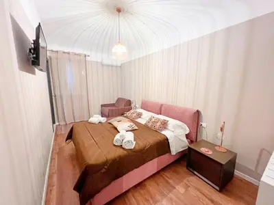 a bedroom with a bed with towels on it at Residenza del Castillo in Palermo