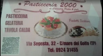 a sign for a restaurant with a picture of food at Casa Mimì in Castellammare del Golfo